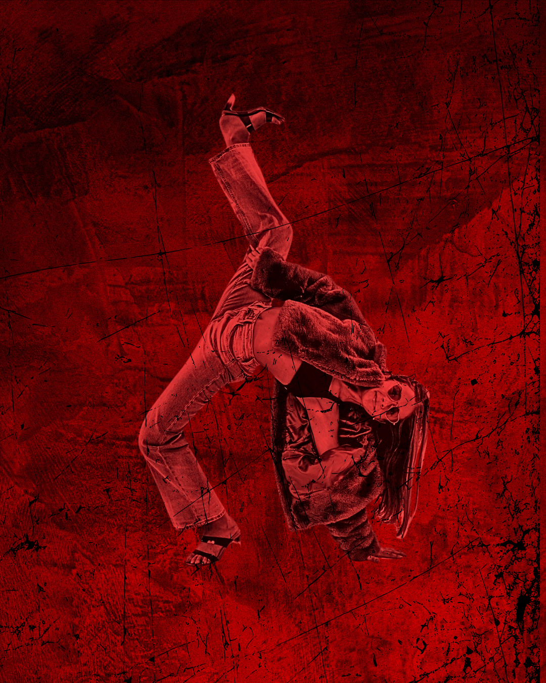 Female dancer leaning backward with leg in the air with red lighting and red background
