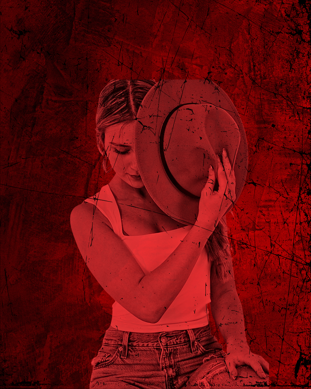 Female dancer covering face with cowboy hat with red lighting and red background